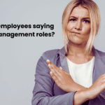 Lady crossing her arms to indicate that employees are declining to take management opportunities
