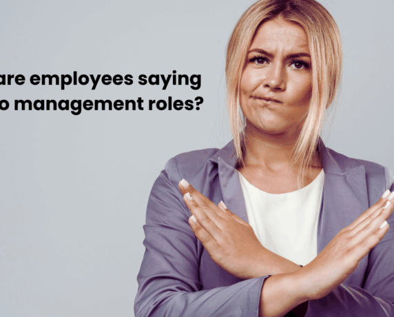 Lady crossing her arms to indicate that employees are declining to take management opportunities